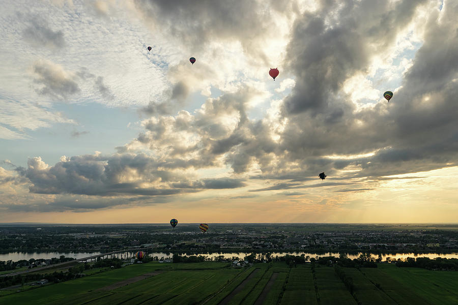 Dramatic Sky Full of Hot Air Balloons Photograph by Georgia Mizuleva