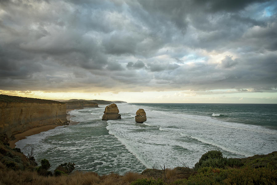Dramatic sky over Great Ocean Road Photograph by Catherine Reading