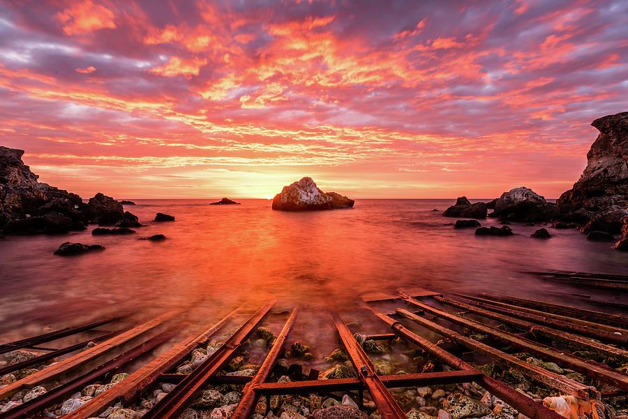 Dramatic sunrise at old harbour. Photograph by Kalinka Georgieva | Fine ...