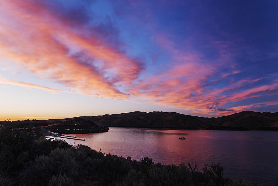 Dramatic sunset over Lucky Peak Reservoir in Boise Idaho Photograph by Vishwanath Bhat