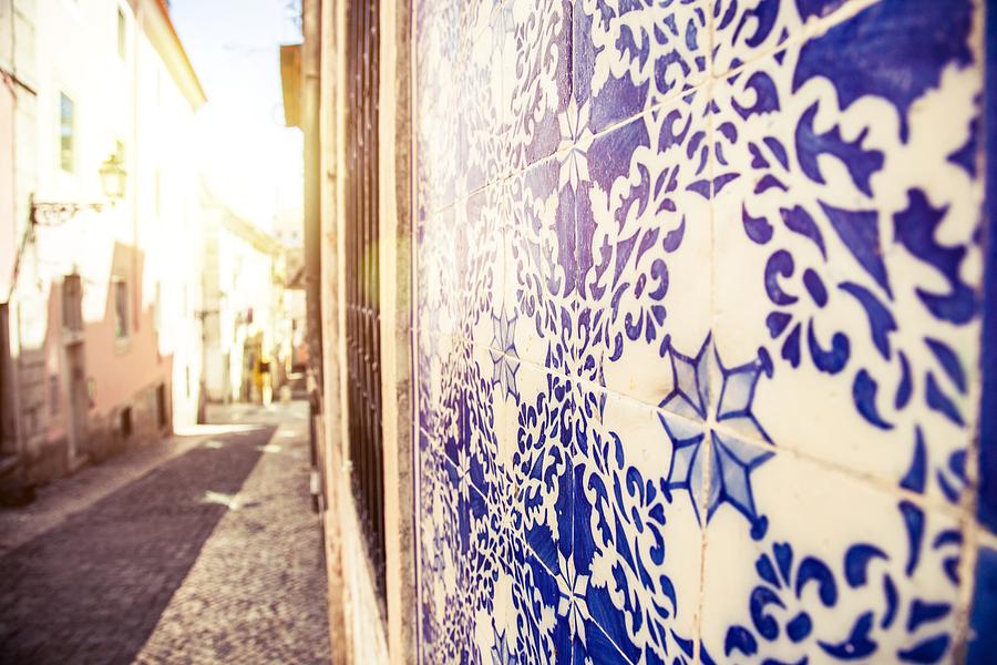 Abstract Photograph - Drawing Tiles on Bairro Alto walls in Lisbon by Leonardo Patrizi