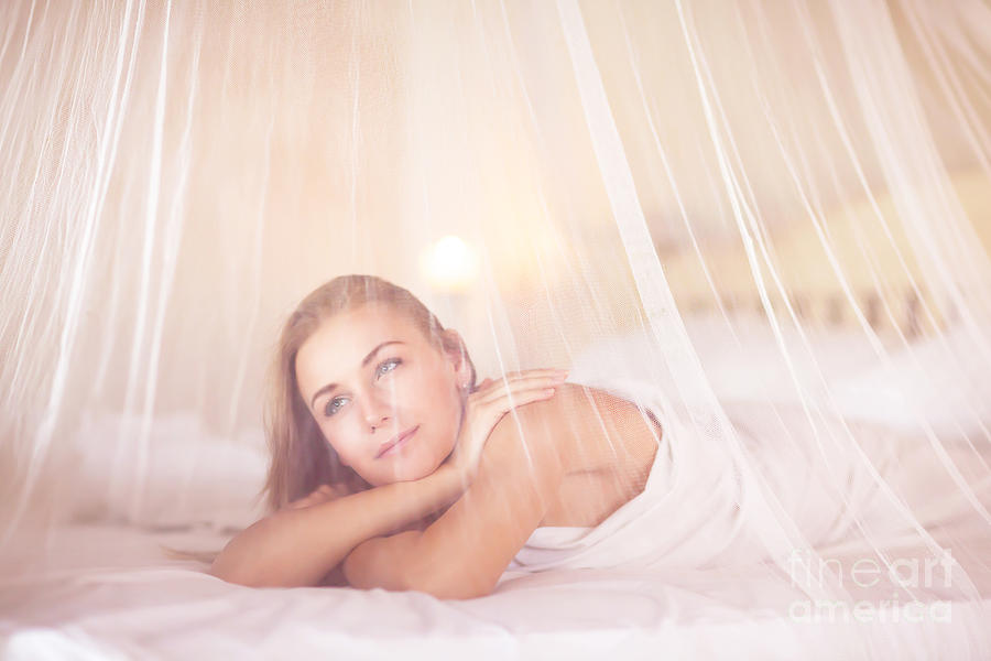 Dreamy woman in bedroom Photograph by Anna Om