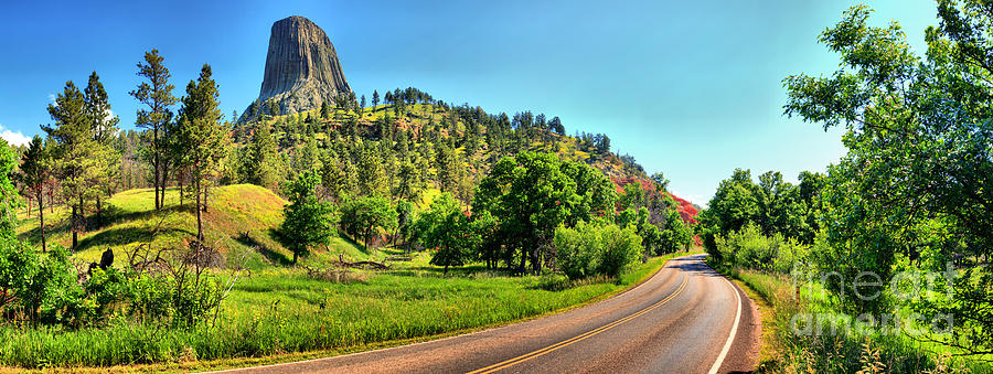 Driving Past Devils Tower Photograph by Adam Jewell