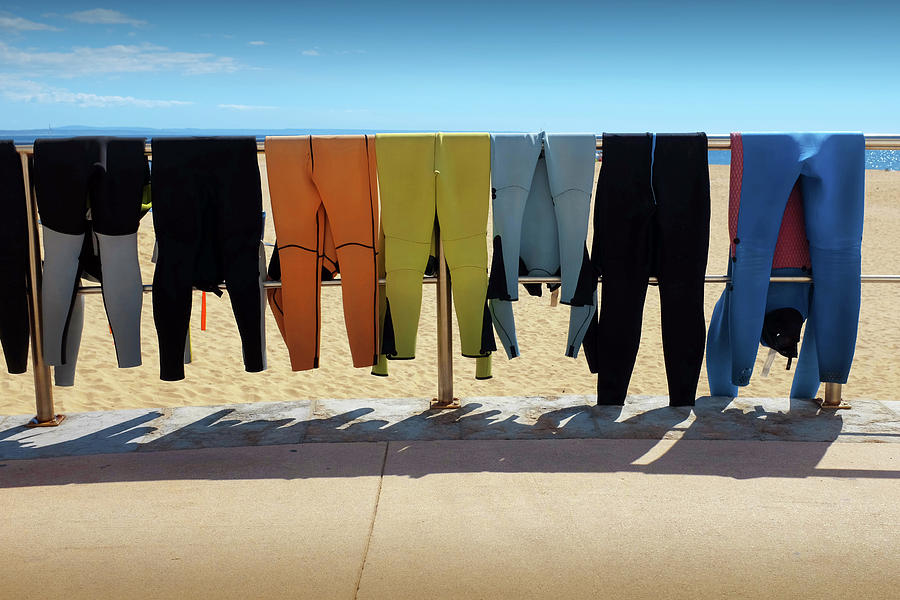 Summer Photograph - Drying Wet Suits by Carlos Caetano