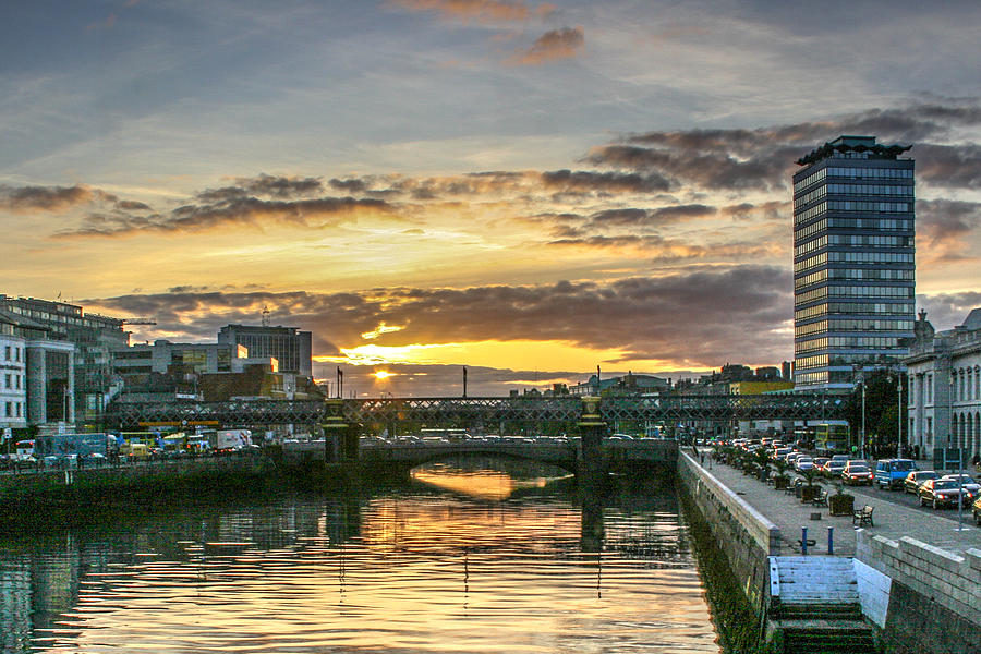 Dublins Liffey River at Sunset Photograph by John A Megaw