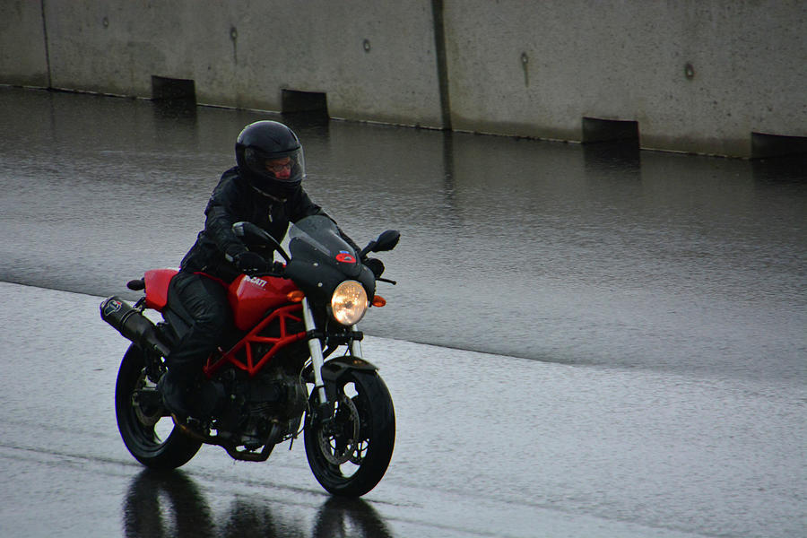 Ducatti in the Rain Photograph by Mike Martin