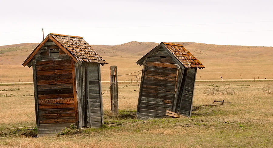Architecture Photograph - Dueling Outhouses by Grant Groberg