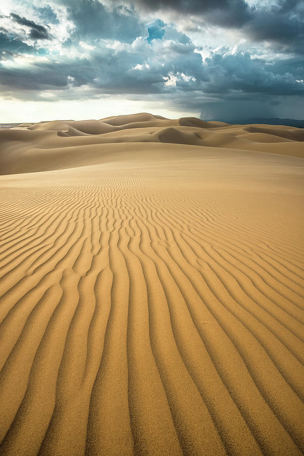 Dunes and Distant Cloudburst Photograph by Alexander Kunz