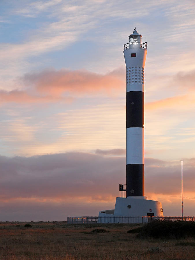 Dungeness Lighthouse at Sunset Photograph by Gill Billington