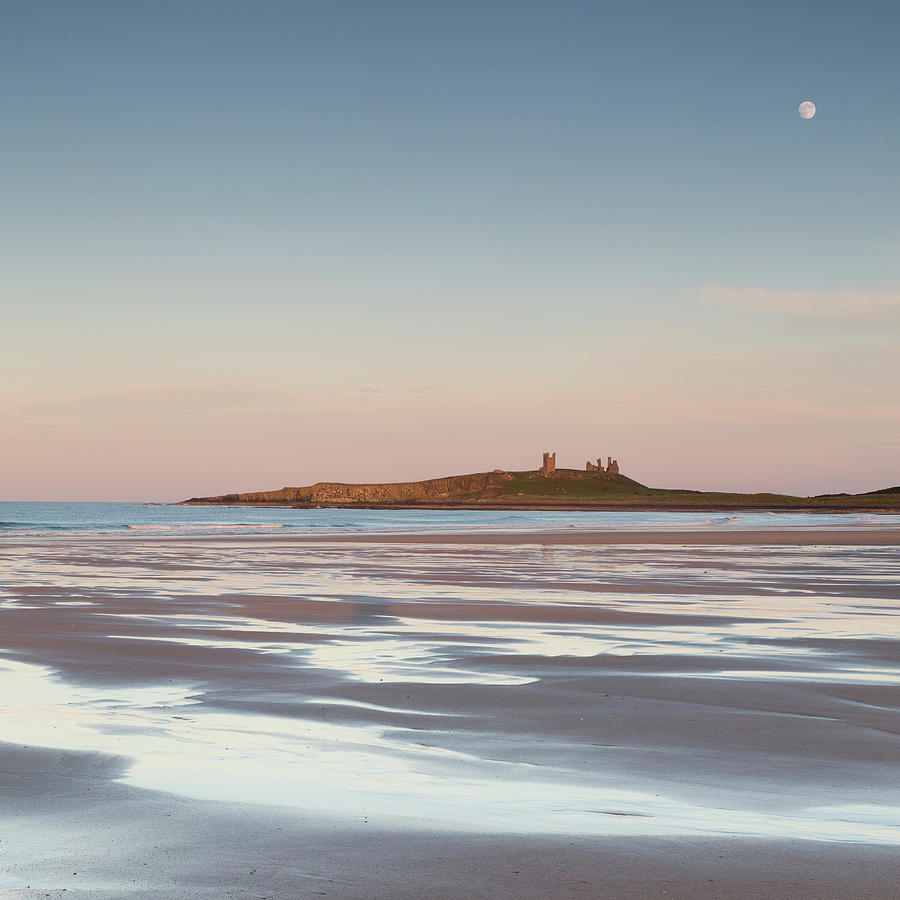 Sunset Photograph - Dunstanburgh Moon by Chris Dale