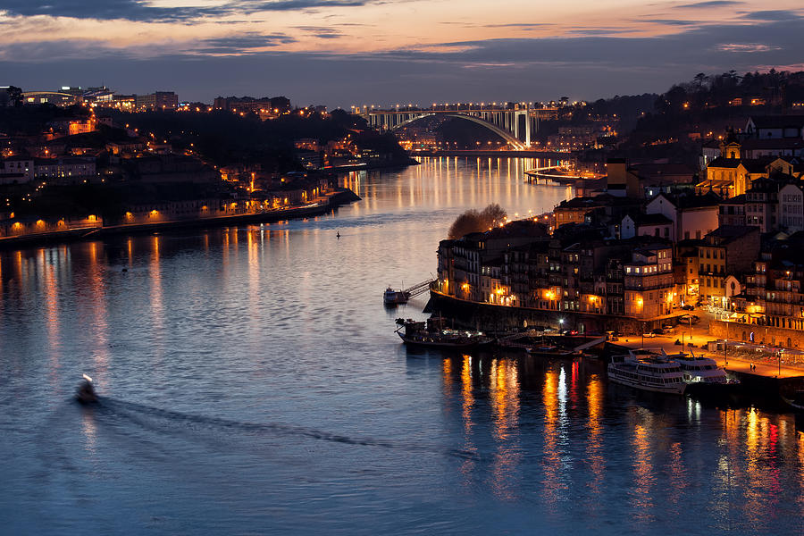 Architecture Photograph - Dusk at Douro River in Porto by Artur Bogacki