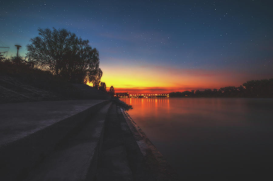 Dusk at the Riverside Photograph by Marc Braner