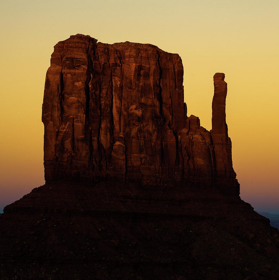 Nature Photograph - Dusk on the Monument Valley Mitten - Arizona - Utah by Gregory Ballos