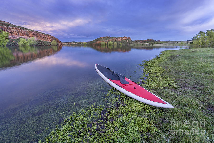 Dusk Over Lake With Paddleboard Photograph by Marek Uliasz