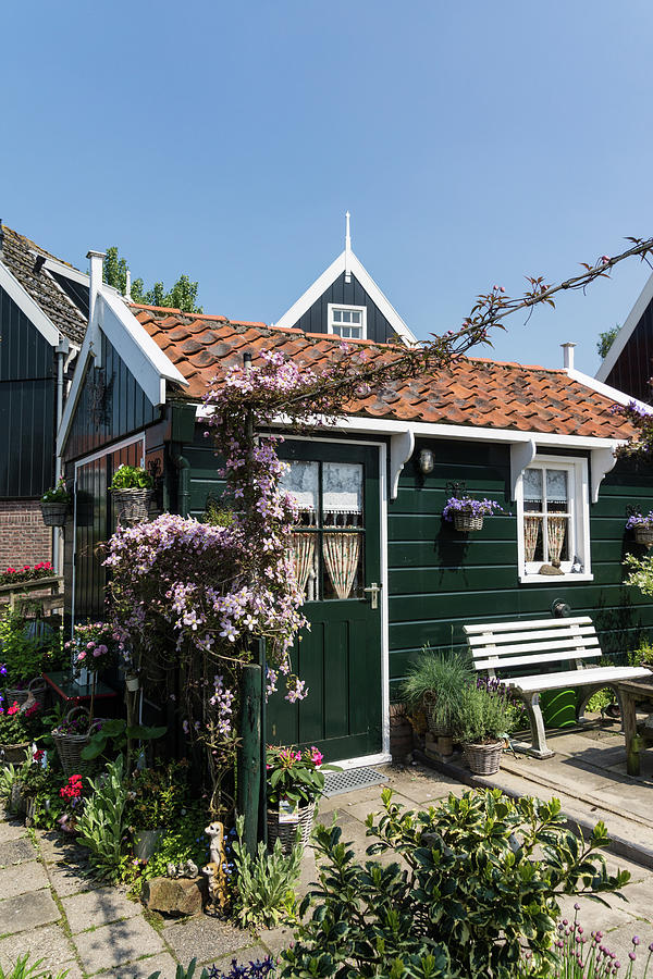 Dutch Country Charm - a Beautiful Little Cottage with Flowers Photograph by Georgia Mizuleva