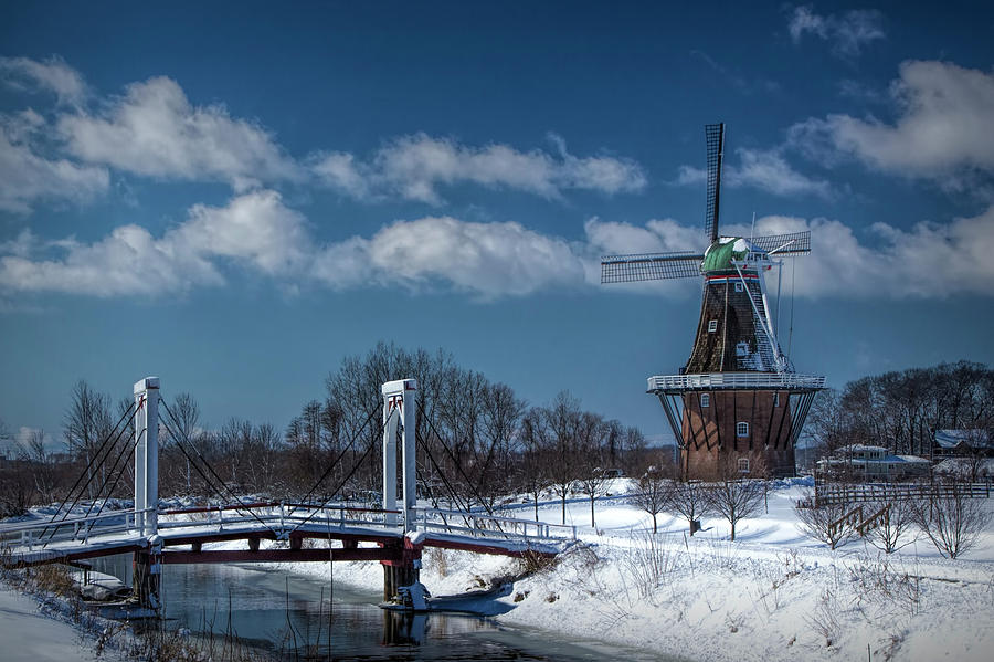 Dutch Windmill and Supension Bridge During Winter  Photograph by Randall Nyhof