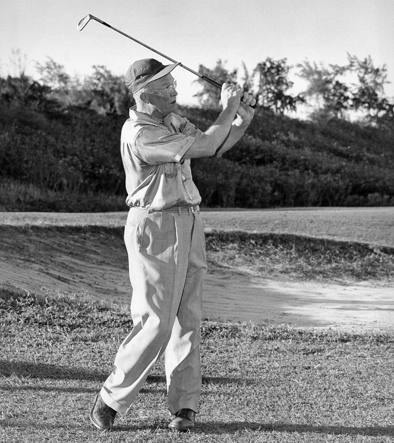 Dwight Eisenhower Golfing Photograph by Underwood Archives