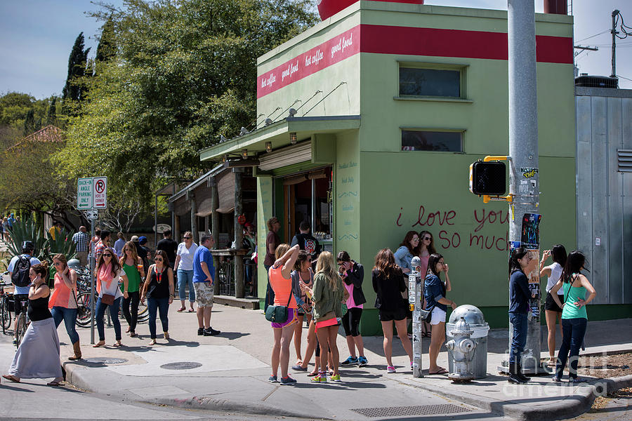 Austin Photograph - Each weekend thousands of people cram South Congress Avenue Austins most hip strip featuring an array of eclectic shops restaurants boutiques antiques music venues and galleries by Dan Herron