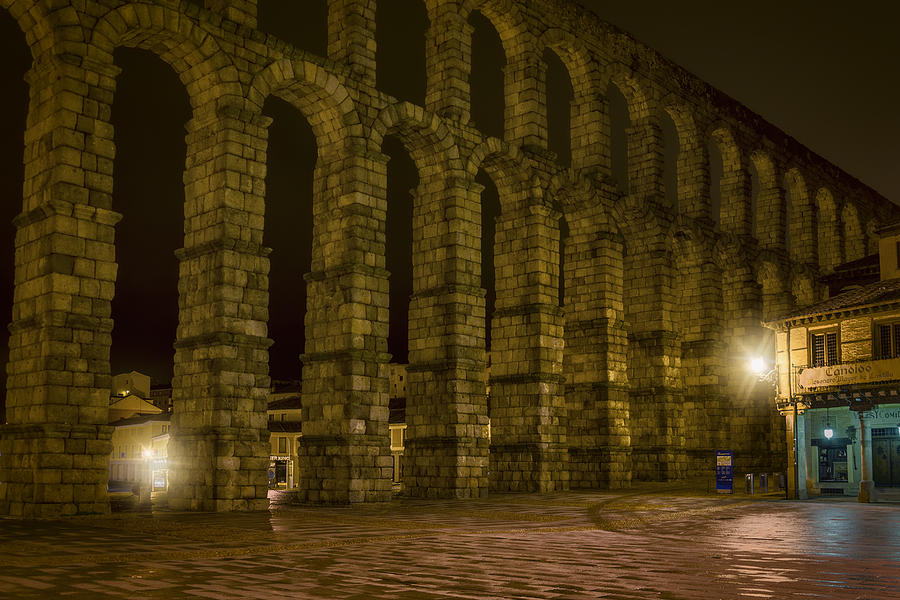 Landmark Photograph - Early Morning at the Aqueduct of Segovia by Joan Carroll