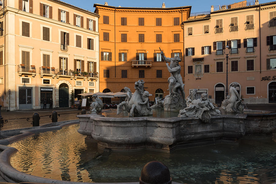 Early Morning Glow - Neptune Fountain on Piazza Navona in Rome Italy Photograph by Georgia Mizuleva