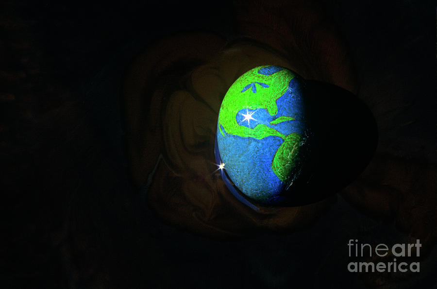 Earth Egg in Oil Slick Photograph by Jim Corwin