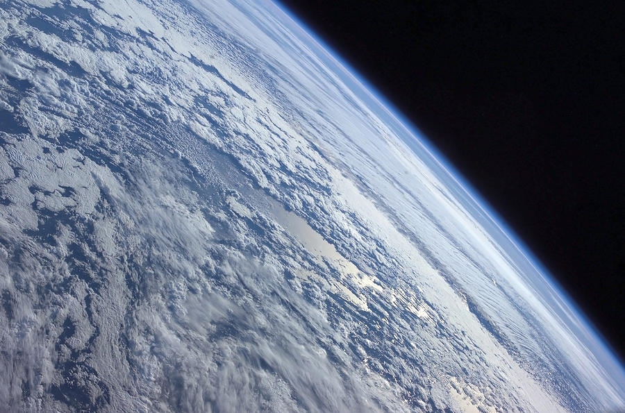 Space Photograph - Earths Horizon Against The Blackness by Stocktrek Images