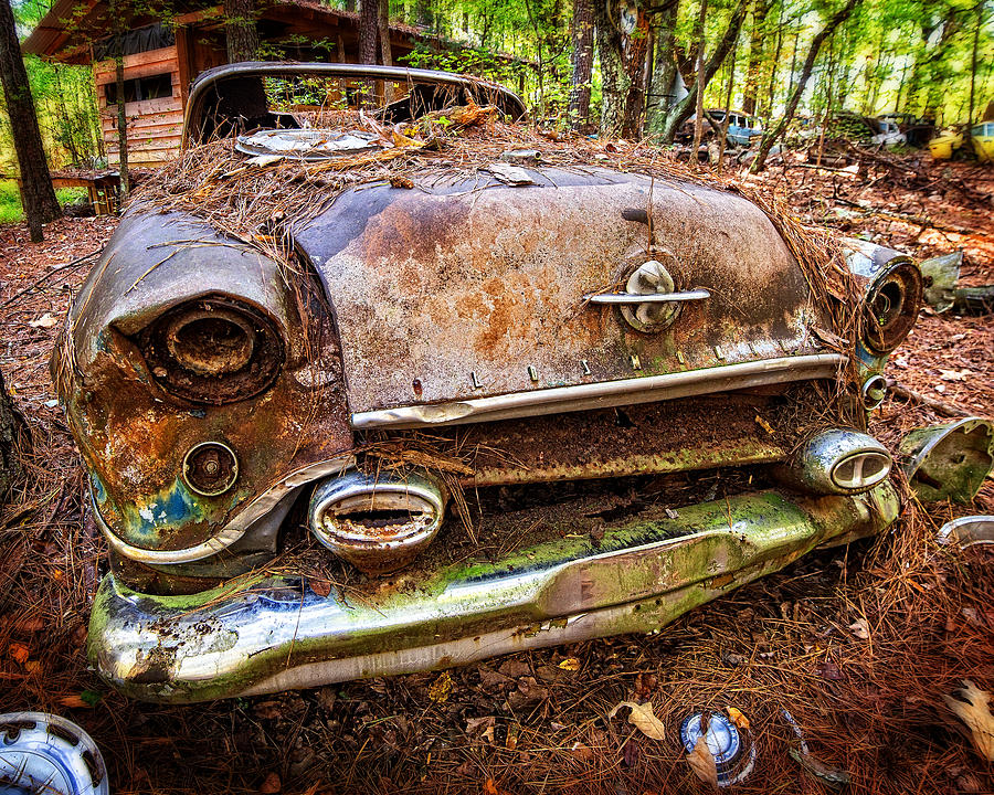 Earthtone Oldsmobile Photograph by Alan Raasch