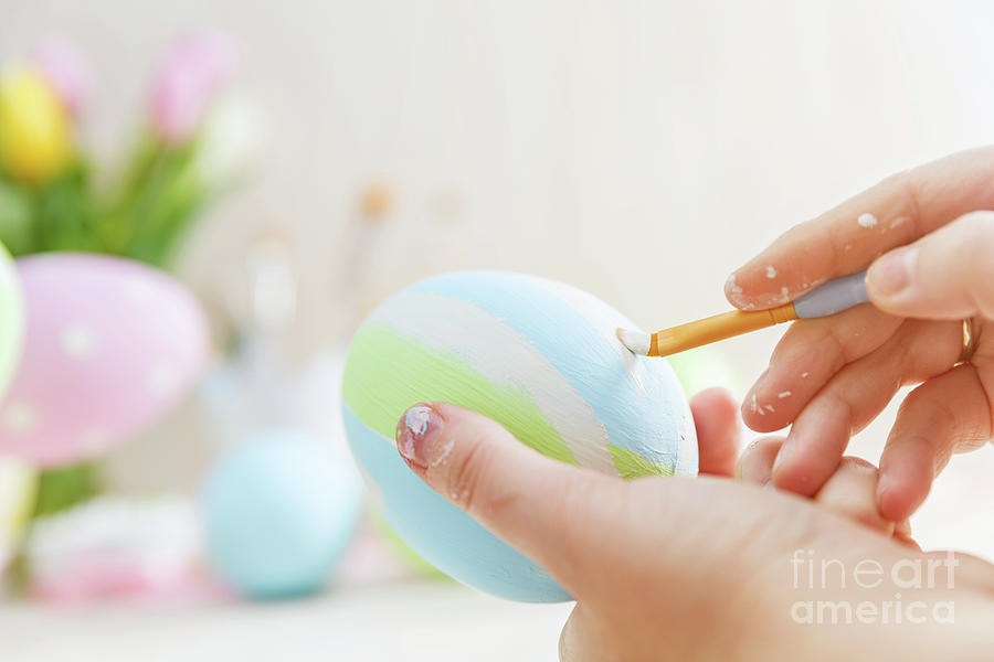 Easter eggs handicrafted with pastel stripes. Photograph by Michal Bednarek