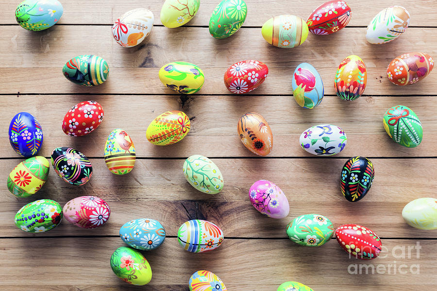 Easter handmade eggs on wooden table. Photograph by Michal Bednarek