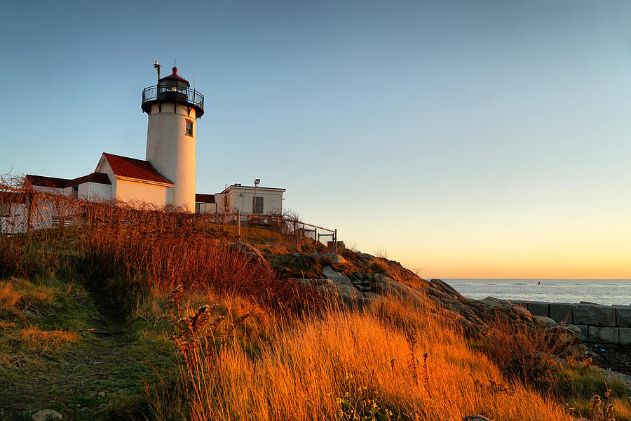 Eastern Point Lighthouse at sunset Photograph by Lilia D