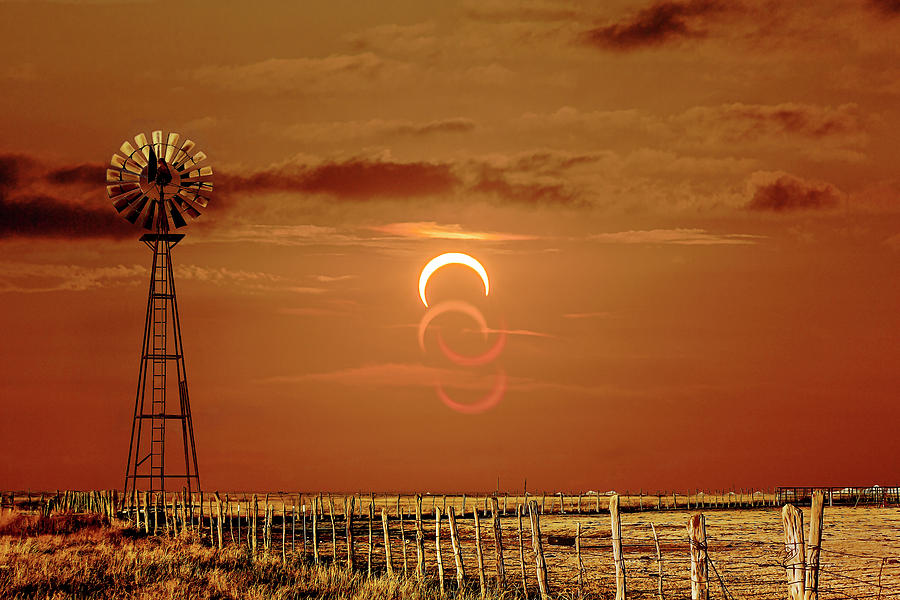 Eclipse and Lens Flares Photograph by Scott Cordell