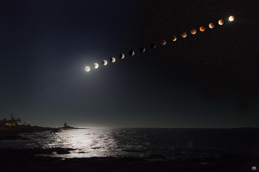 Eclipse of the Moon Photograph by John Meader
