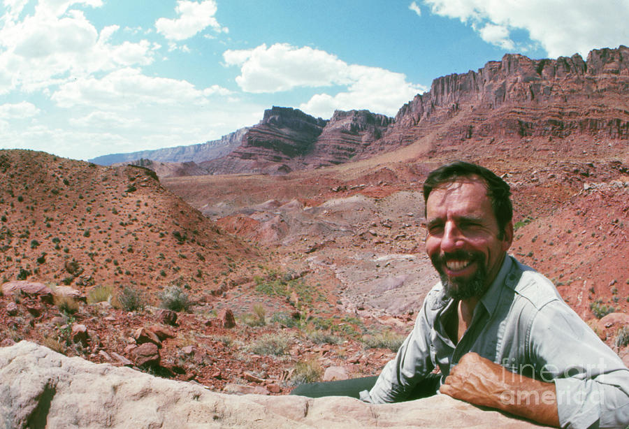 Edward Abbey in the desert, 1969 Photograph by The Harrington Collection