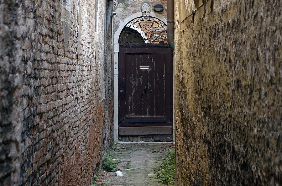 Eerie Alley Leading Up To Mysterious Doorway In Venice Italy Photograph