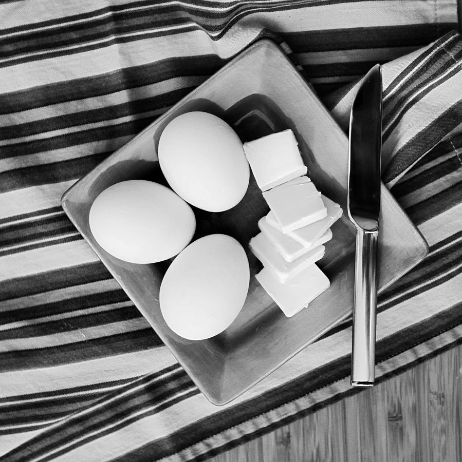 Eggs and Butter on Plate Photograph by Rebecca Cozart