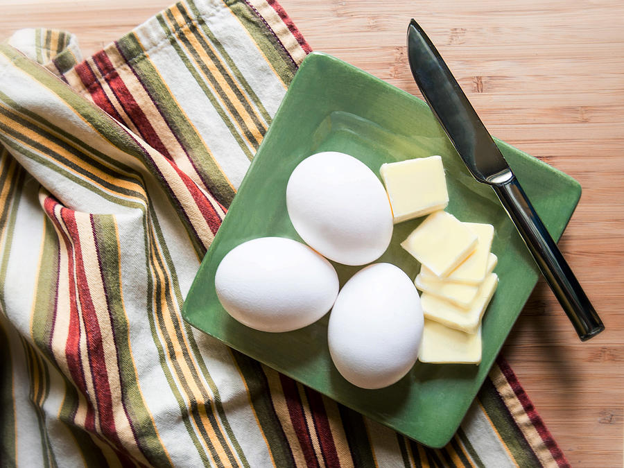 Eggs and Butter with Knife Photograph by Rebecca Cozart
