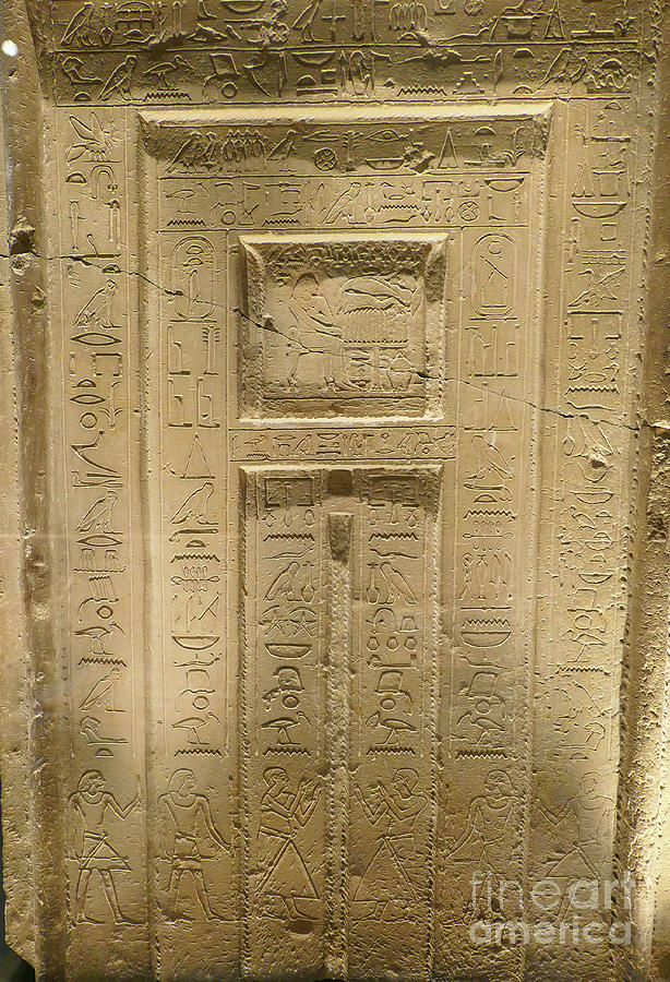 Egyptian hieroglyphics on stone door Photograph by Patricia Hofmeester