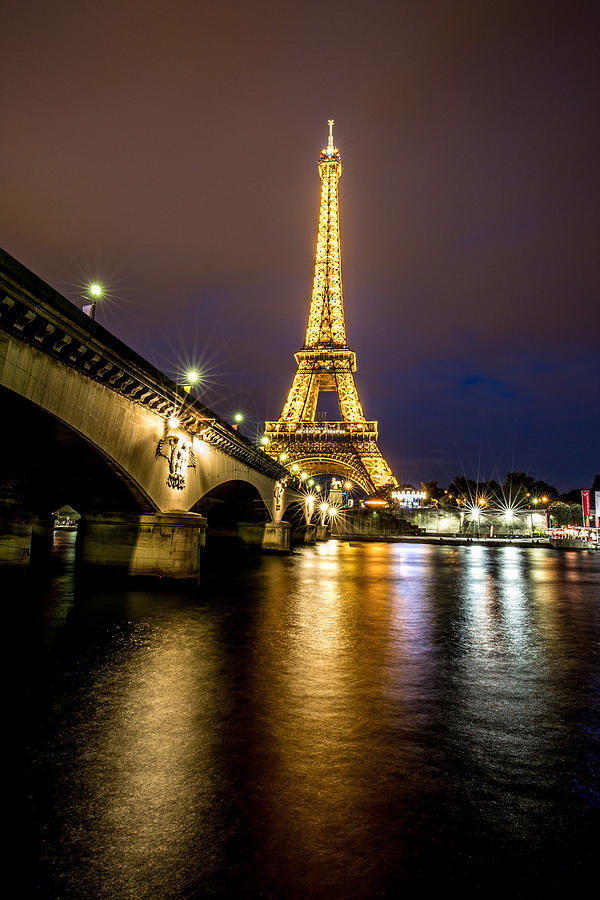 Eiffel Tower at Night Photograph by Lev Kaytsner