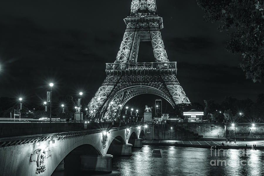 Eiffel Tower at Night Lit Up in Black and White Photograph by Alissa