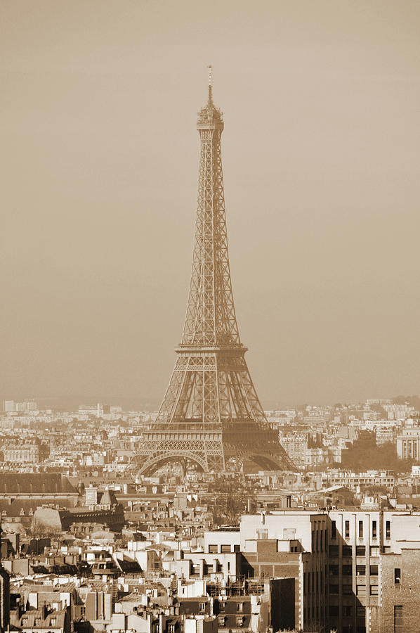 Eiffel Tower Rising Above Central Paris France Rooftops Sepia Photograph by Shawn OBrien