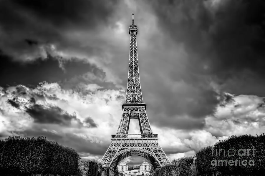 Eiffel Tower seen from Champ de Mars park in Paris, France. Black and white Photograph by Michal Bednarek
