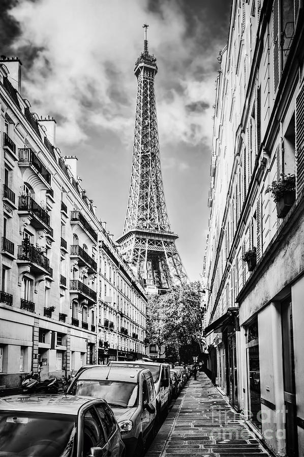 Eiffel Tower seen from the street in Paris, France. Black and white Photograph by Michal Bednarek