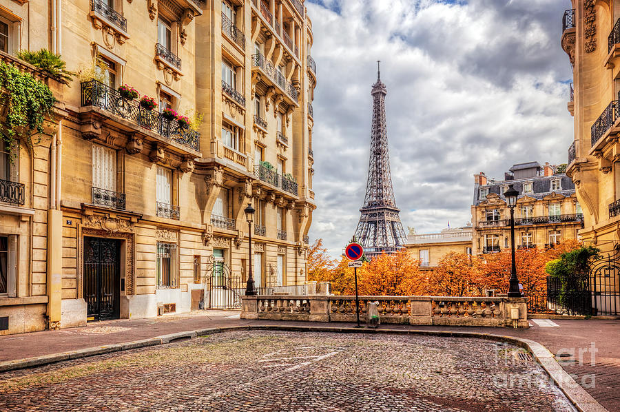 Eiffel Tower seen from the street in Paris, France.  Cobblestone pavement Photograph by Michal Bednarek