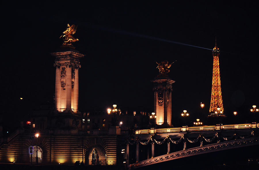 Eiffel Tower with Searchlight and Pont Alexander Columns at Night from the Seine River Paris France Photograph by Shawn OBrien