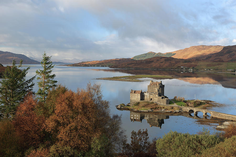 Eilean Donan Castle in Autumn Photograph by Maria Gaellman