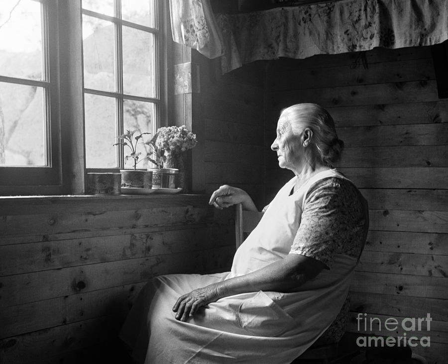 Elderly Woman At Window, C.1950s Photograph by H. Armstrong Roberts/ClassicStock