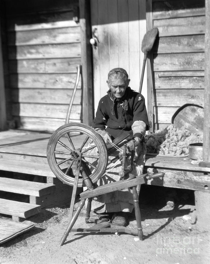 Elderly Woman Spinning Wool, C.1920s Photograph by H. Armstrong Roberts/ClassicStock