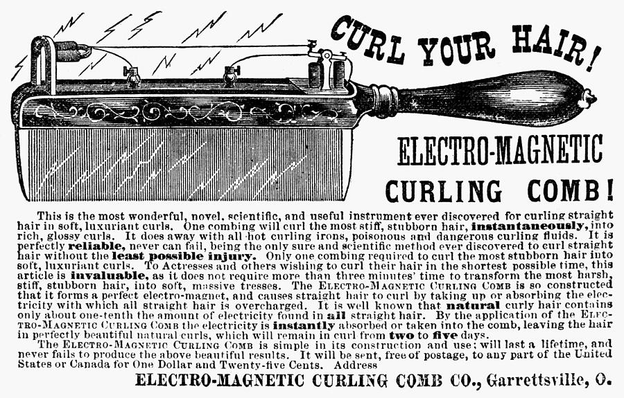 Electric Curling Comb Photograph by Granger