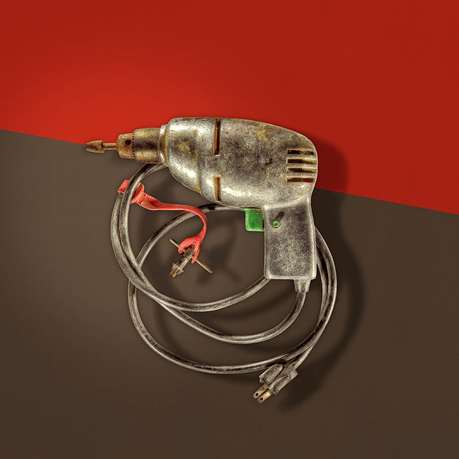 Electric Drill Motor, Green Trigger on Colored Paper Photograph by YoPedro