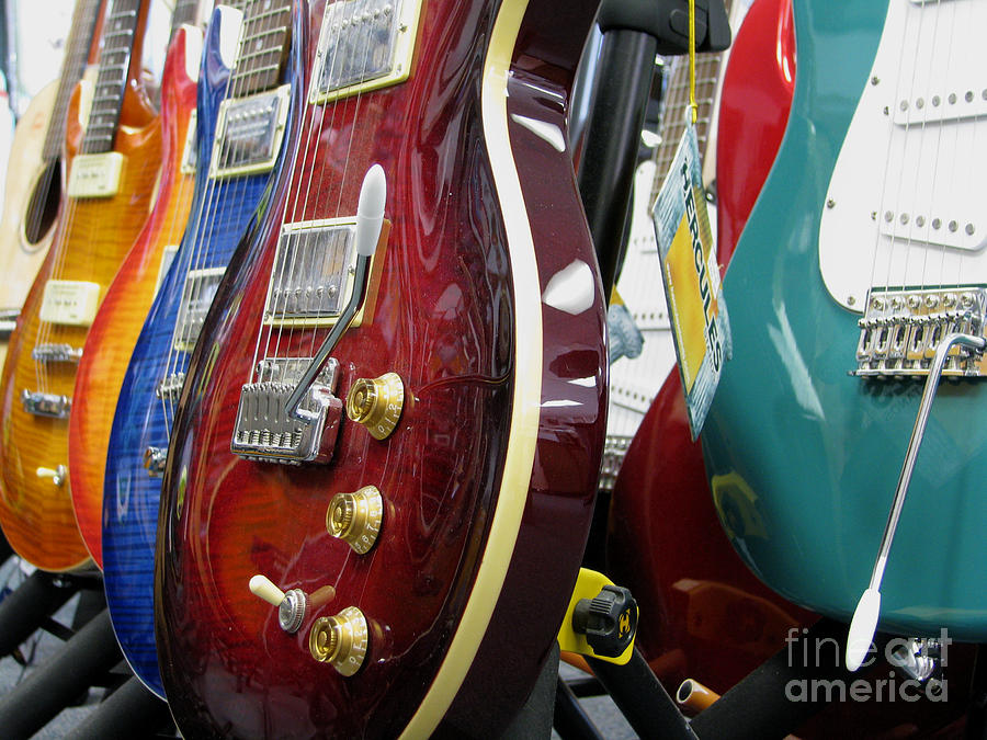 Electric Guitars For Sale Photograph by James B Toy